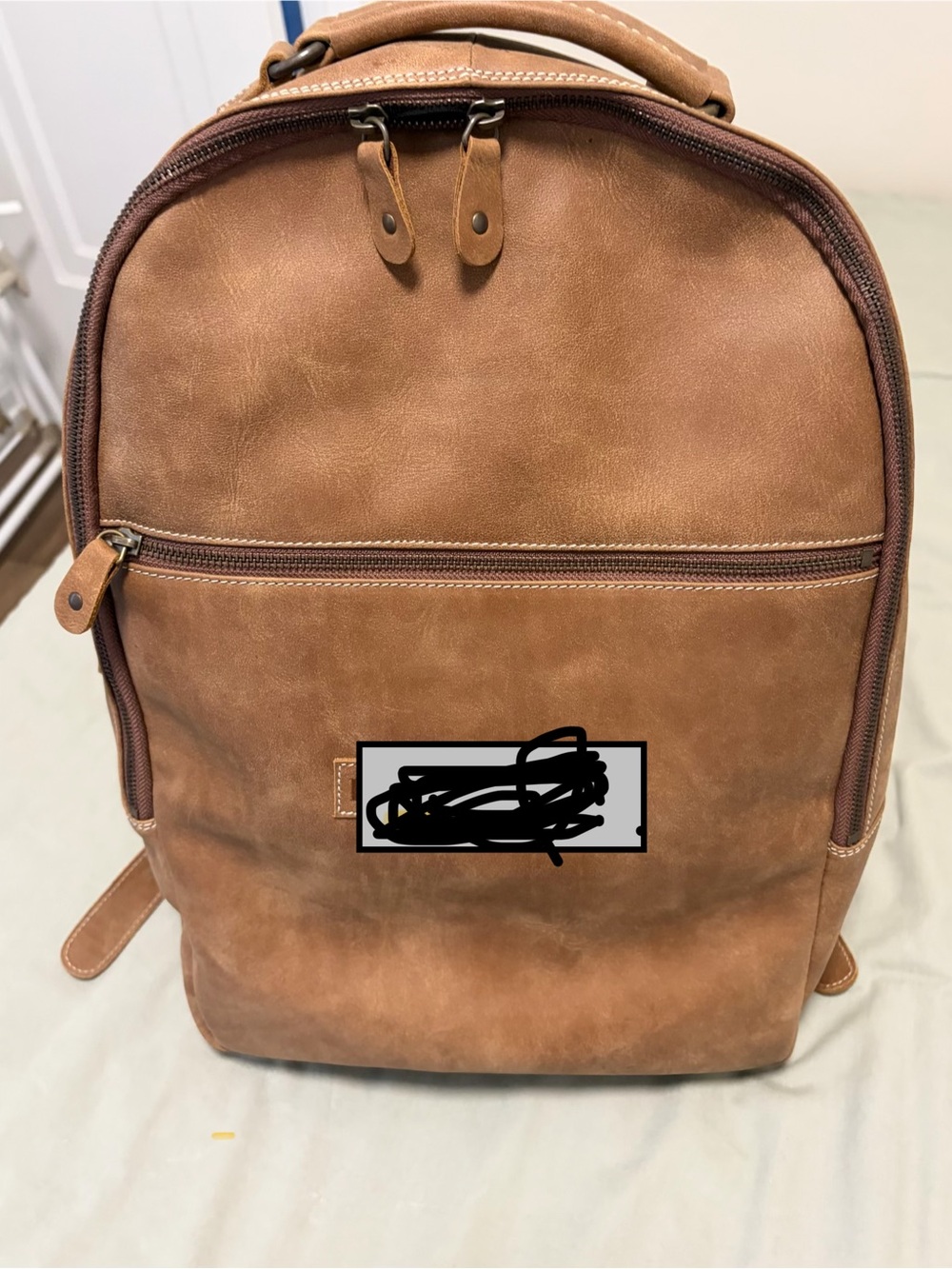 Root’s Brown Leather Backpack